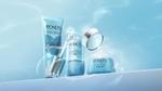 Three Pond’s Hydra Miracle Ultra Light products. Blue with silver accents. A bottle of serum is open, the pipette is visible.